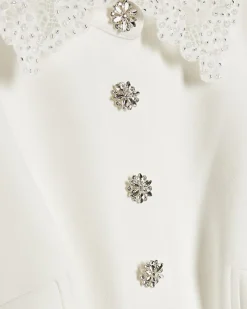 White Frill Sleeve Diamante Peplum Top